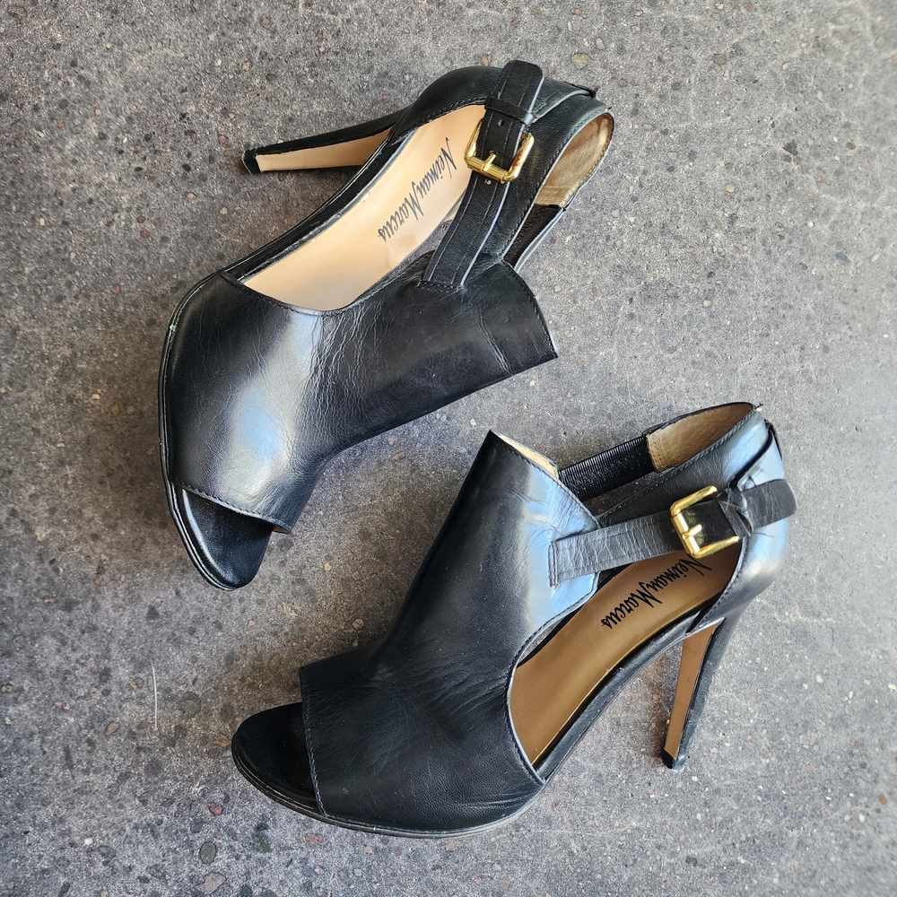 Elegant Black Stiletto Heels with Slingback Design